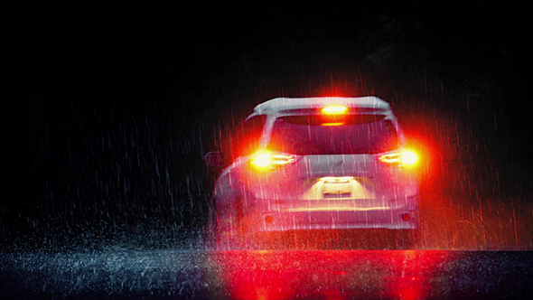 Dramatic Car Drives In Rain With Brake Lights