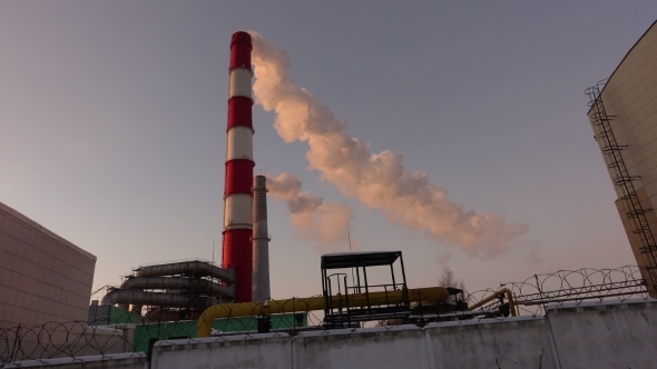 White Smoke Coming Out Of An Industrial Chimney