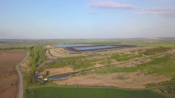 Landfill for Solid Waste of a Thermal Power Plant. Aerial Video of a Crowded Ash Dump. Ash, Slag