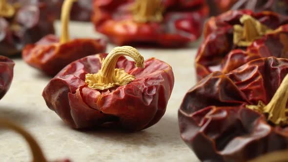 Sundried sweet Spanish whole Nora peppers close up 