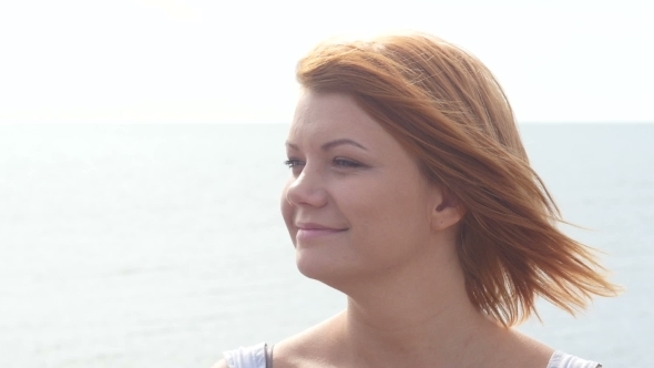 Portrait Of Beautiful Young Redhead Woman