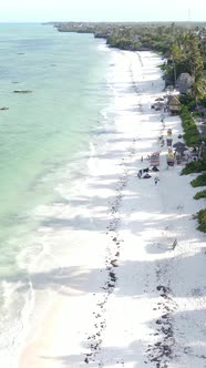 Vertical Video Boats in the Ocean Near the Coast of Zanzibar Tanzania