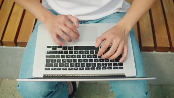 Man Using Laptop Outdoor Top View