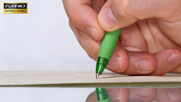 Caucasian Young Man Handwriting with a Ballpoint Pen