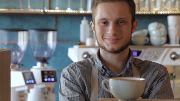 Handsome Barista Making a Cup Of Coffee