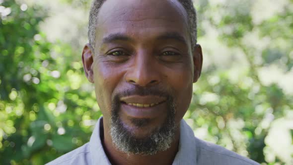 Senior African American man smiling and looking at the camera