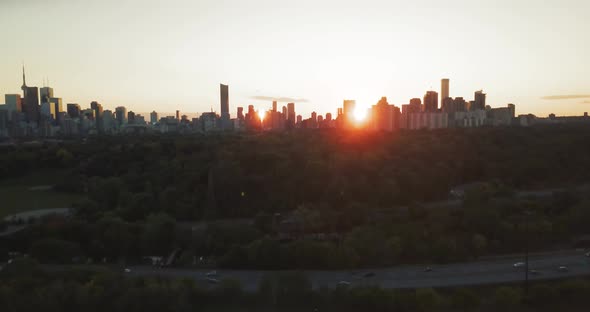 Aerial Drone Shot of Toronto City at Sunset While Camera Rises