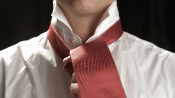 Tie dressing by anonymous businessman studio