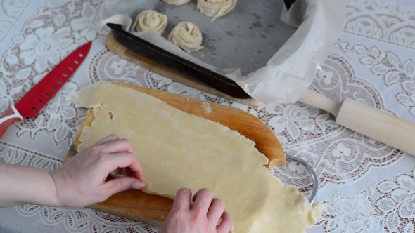 Housewife Preparing Bun Of Puff Pastry