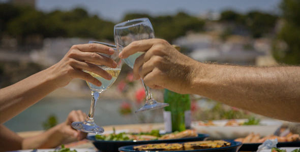 Couple Toasting In A Mediterranean Village alt