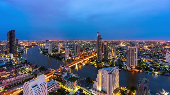 day to night motion time lapse of Bangkok city with Chao Phraya River, Thailand