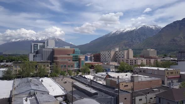 Aerial view flying over buildings in downtown Provo, Utah