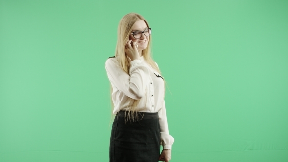 Business Woman Speaks on the Phone Green Screen