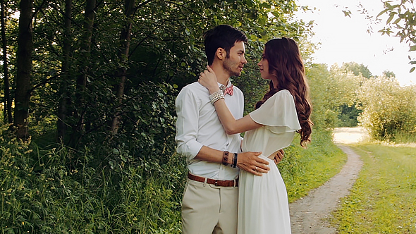 Happy Couple In The Forest