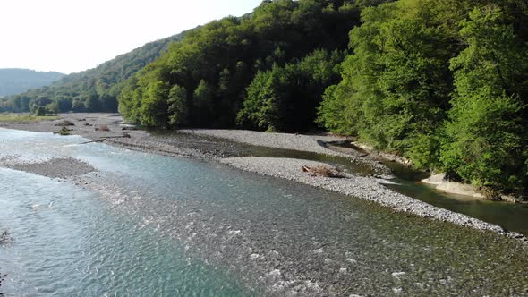 Majestic Aerial Flight Through Epic Landscape River