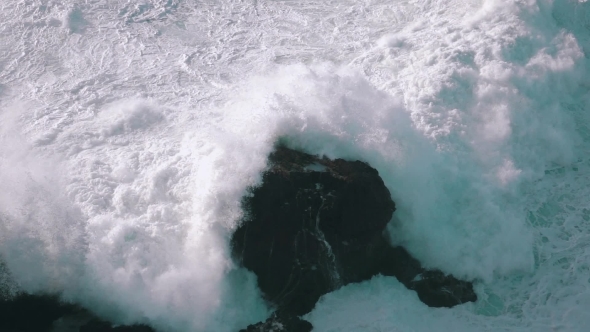 Ocean Waves Breaking On Rocks