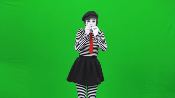 Mime Girl Is Inflating a Balloon
