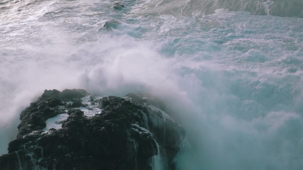 Ocean Waves Breaking On Rocks