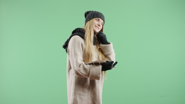 Happy Girl Listening To Music On Headphones Winter In The Winter
