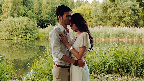 Romantic Young Couple Near The River