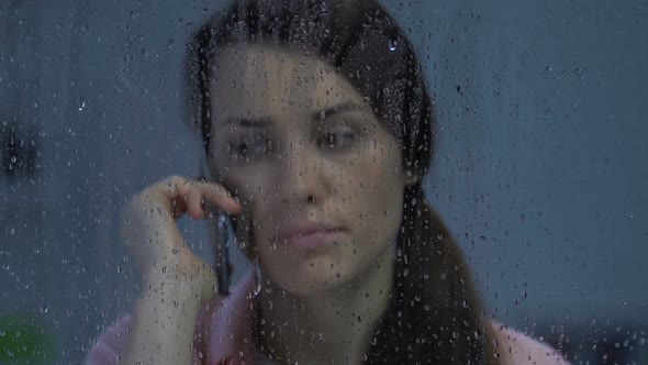 Depressed Lonely Woman Talking on Phone, Bad News on Rainy Day, Frustration