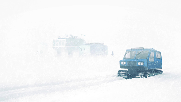 Arctic Base With Man Returning From Snowcat