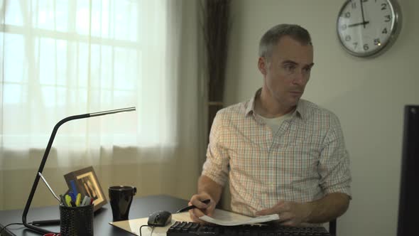 Working At His Office Desk 3