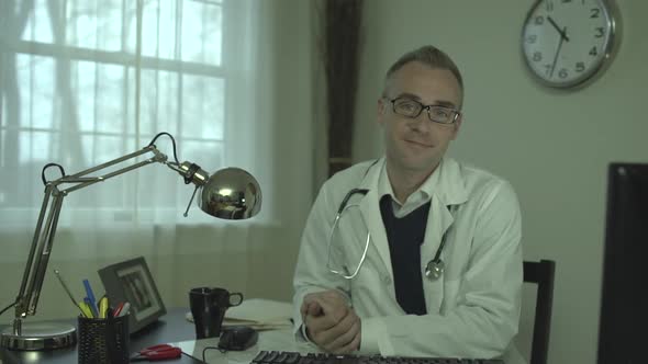 Doctor At His Office Desk alt