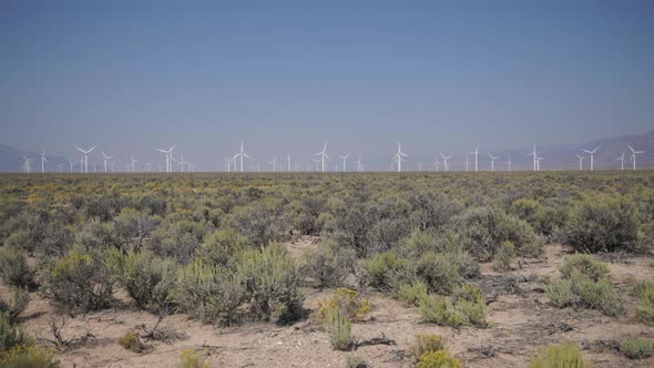 Pan Up Of A Windfarm In The Desert
