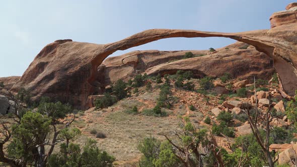 Pan Up Shot Of Landscape Arch In Arches National Park alt