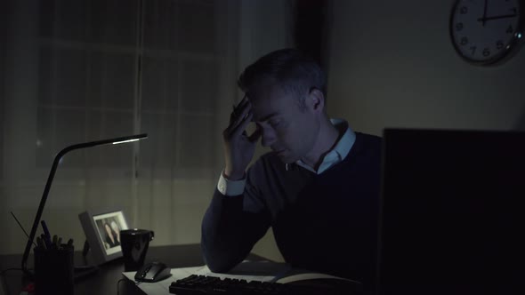 Sad Man At His Office Desk 1