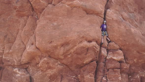 View Of A Rock Climber In Arches National Park 1