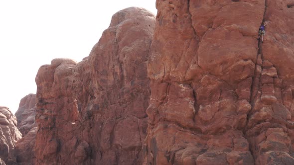 View Of A Rock Climber In Arches National Park 2