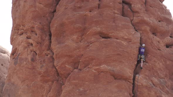 View Of A Rock Climber In Arches National Park 5