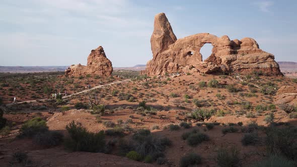 Crane Shot Of A Woman Admiring View In Arches National Park 2 alt