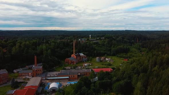 Old Ligatne Paper Mill Village From Above in Ligatne, Latvia. Aerial Dron Shot 4K Video