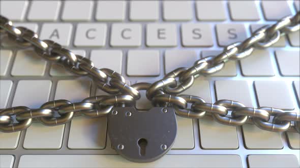 Padlock and Chains on the Keyboard with ACCESS Text alt