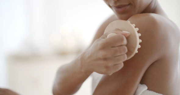 Woman Massaging Hand In Spa