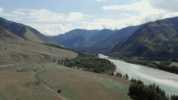 Blue Katun river in the middle of mountains of Ak-Kem valley in Altai