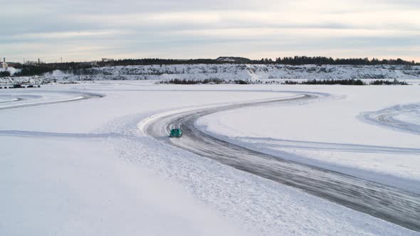 Aerial View of a Racing Car at an Ice Rally