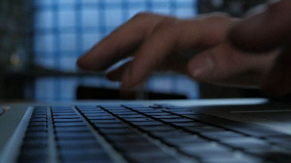 Man Typing On Keyboard