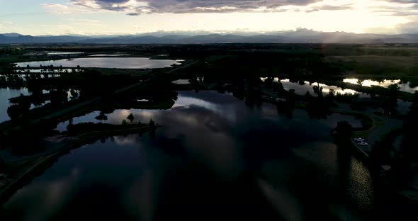 Glorious mountain sunset with reflections in lakes and ponds. Shot by drone from 185ft 4k 60fps