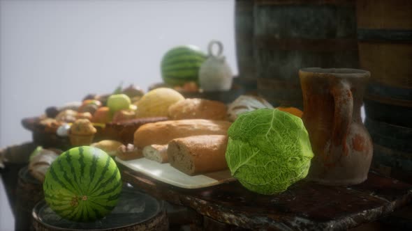 Food Table with Wine Barrels and Some Fruits, Vegetables and Bread