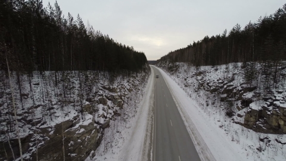 Car Rides By Road At Winter Day. Aerial View