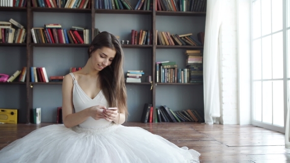 Professional Ballet Dancer Talking On The Phone alt