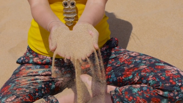 Sand Falling From Hand