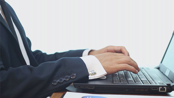 Businessman Working on the Computer in the Office