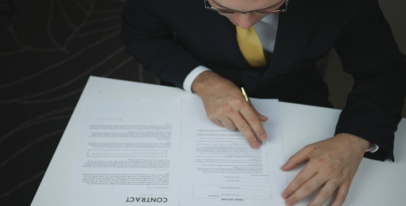 Businessman Signing Contract 
