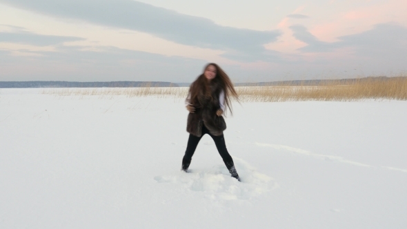 Winter Joyful Girl Playing Snowballs