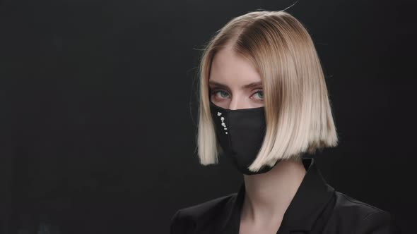 Portrait of Elegant Woman in Beaded Face Mask